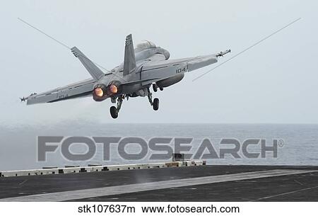 An F/A-18F Super Hornet taking off from USS Nimitz. View Large Photo Image Picture - An F/A-18F Super Hornet taking off from USS Nimitz.. Fotosearch