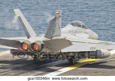 An F/A-18F Super Hornet taking off. View Large Photo Image Picture - An F/A-18F Super Hornet taking off.. Fotosearch