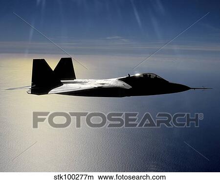 An F/A-22 Raptor flies a training mission. View Large Photo Image Picture - An F/A-22 Raptor flies a training mission.. Fotosearch