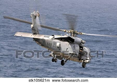 An HH-60H Sea Hawk helicopter in flight. View Large Photo Image Picture - An HH-60H Sea Hawk helicopter in flight.. Fotosearch