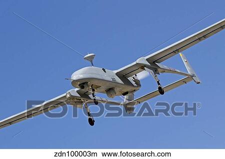 An IAI Heron unmanned aerial vehicle in flight over Israel. View Large Photo Image Picture - An IAI Heron unmanned aerial vehicle in flight over Israel.. Fotosearch