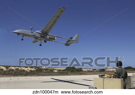 An IAI Heron Unmanned Aerial Vehicle takes off the runway. View Large Photo Image Picture - An IAI Heron Unmanned Aerial Vehicle takes off the runway.. Fotosearch