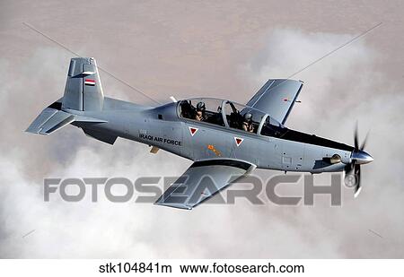 An Iraqi Air Force T-6 Texan trainer aircraft over Tikrit, Iraq. View Large Photo Image Picture - An Iraqi Air Force T-6 Texan trainer aircraft over Tikrit, Iraq.. Fotosearch