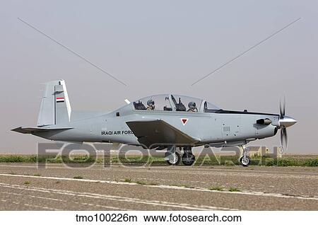 An Iraqi Air Force T-6 Texan trainer aircraft taxis out for a flight over Tikrit, Iraq. View Large Photo Image Picture - An Iraqi Air Force T-6 Texan trainer aircraft taxis out for a flight over Tikrit, Iraq.. Fotosearch