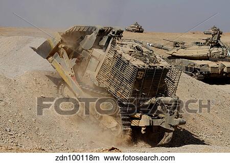 An Israel Defense Force Caterpillar D-9 clearing the way. View Large Photo Image Picture - An Israel Defense Force Caterpillar D-9 clearing the way.. Fotosearch