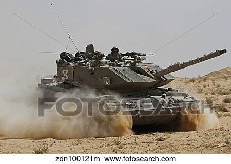 An Israel Defense Force Magach 7 main battle tank in the Negev desert. View Large Photo Image Picture - An Israel Defense Force Magach 7 main battle tank in the Negev desert.. Fotosearch