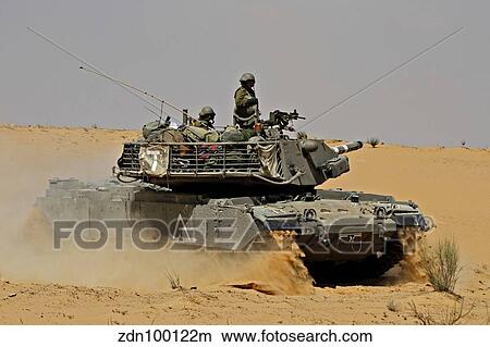 An Israel Defense Force Magach 7 main battle tank in the Negev desert. View Large Photo Image Picture - An Israel Defense Force Magach 7 main battle tank in the Negev desert.. Fotosearch