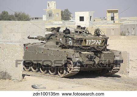 An Israel Defense Force Merkava Mark II main battle tank in urban warfare. View Large Photo Image Picture - An Israel Defense Force Merkava Mark II main battle tank in urban warfare.. Fotosearch