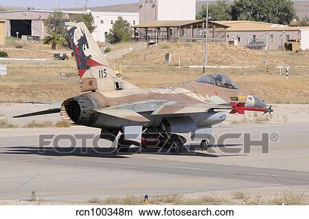 Picture - An Israeli Air Force F-16B Netz taxiing at Nevatim Airbase.. Fotosearch