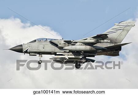 An Italian Air Force Panavia Tornado ECR returns from a mission over Libya. View Large Photo Image Picture - An Italian Air Force Panavia Tornado ECR returns from a mission over Libya.. Fotosearch