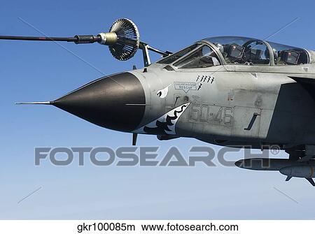 An Italian Air Force Tornado IDS conducts in-flight refueling. View Large Photo Image Picture - An Italian Air Force Tornado IDS conducts in-flight refueling.. Fotosearch