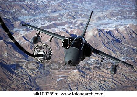 An Italian AMX approaches a KC-10A Extender to refuel over Afghanistan. View Large Photo Image Picture - An Italian AMX approaches a KC-10A Extender to refuel over Afghanistan.. Fotosearch