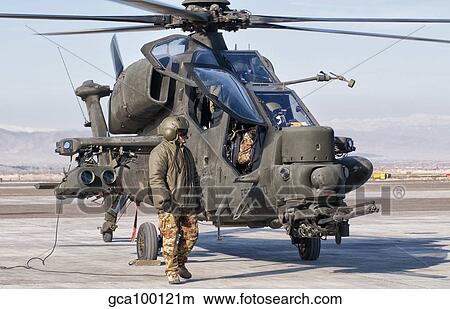 An Italian Army Agusta AW129 Mangusta attack helicopter. View Large Photo Image Picture - An Italian Army Agusta AW129 Mangusta attack helicopter.. Fotosearch