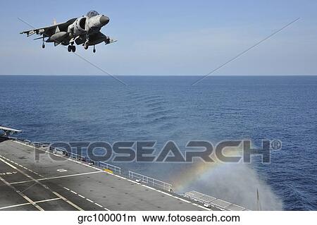 An Italian Navy Av-8B Harrier II prepares for landing. View Large Photo Image Picture - An Italian Navy Av-8B Harrier II prepares for landing.. Fotosearch