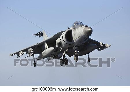 An Italian Navy Av-8B Harrier II prepares for landing. View Large Photo Image Picture - An Italian Navy Av-8B Harrier II prepares for landing.. Fotosearch