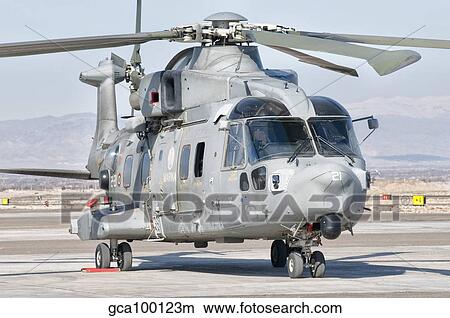 An Italian Navy EH101 helicopter at Forward Operating Base Herat, Afghanistan. View Large Photo Image Picture - An Italian Navy EH101 helicopter at Forward Operating Base Herat, Afghanistan.. Fotosearch