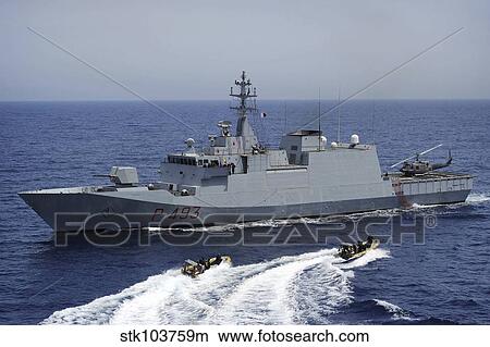 An Italian visit, board, search and seizure team returns to the Italian navy offshore patrol vessel ITS Comandante Foscari. View Large Photo Image Picture - An Italian visit, board, search and seizure team returns to the Italian navy offshore patrol vessel ITS Comandante Foscari.. Fotosearch