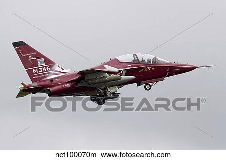 An M-346T Master trainer aircraft in flight over Italy. View Large Photo Image Picture - An M-346T Master trainer aircraft in flight over Italy.. Fotosearch