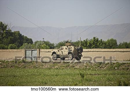 An M-ATV driving towards Aliabad from Kunduz, Afghanistan. View Large Photo Image Picture - An M-ATV driving towards Aliabad from Kunduz, Afghanistan.. Fotosearch