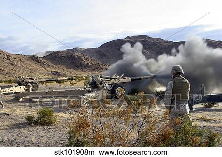 An M198 Howitzer fires a 155-millimeter rocket assisted projectile. View Large Photo Image Picture - An M198 Howitzer fires a 155-millimeter rocket assisted projectile.. Fotosearch