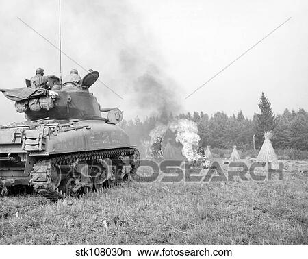 An M4A3E8 76mm armed Sherman tank with flame thrower. View Large Photo Image Picture - An M4A3E8 76mm armed Sherman tank with flame thrower.. Fotosearch