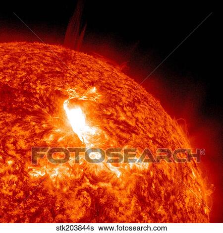 An M8. 7 class flare erupts on the Sun's surface. View Large Photo Image Stock Photograph - An M8. 7 class flare erupts on the Sun's surface.. Fotosearch