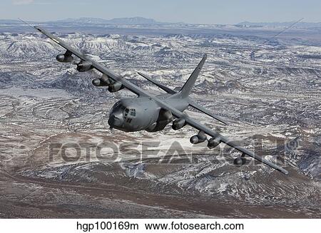 An MC-130 aircraft manuevers during a training mission over New Mexico. View Large Photo Image Picture - An MC-130 aircraft manuevers during a training mission over New Mexico.. Fotosearch