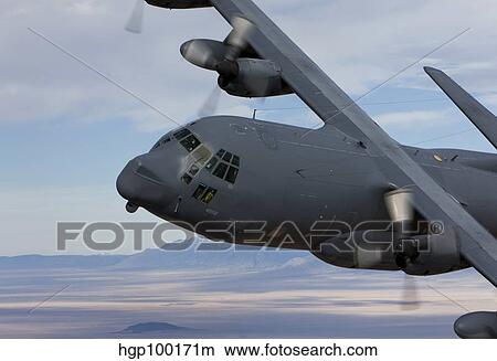 An MC-130 aircraft manuevers during a training mission over New Mexico. View Large Photo Image Picture - An MC-130 aircraft manuevers during a training mission over New Mexico.. Fotosearch