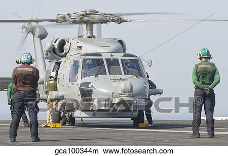 An MH-60R Seahawk embarked aboard USS Theodore Roosevelt. View Large Photo Image Picture - An MH-60R Seahawk embarked aboard USS Theodore Roosevelt.. Fotosearch