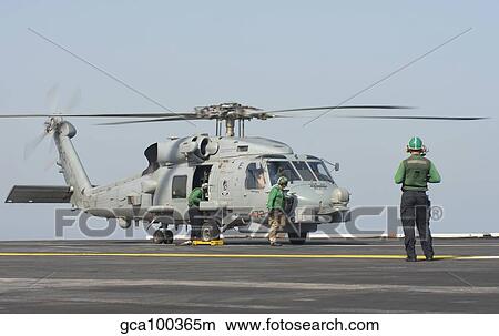 An MH-60R Seahawk embarked aboard USS Theodore Roosevelt. View Large Photo Image Picture - An MH-60R Seahawk embarked aboard USS Theodore Roosevelt.. Fotosearch