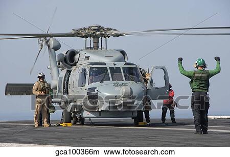 An MH-60R Seahawk embarked aboard USS Theodore Roosevelt. View Large Photo Image Picture - An MH-60R Seahawk embarked aboard USS Theodore Roosevelt.. Fotosearch