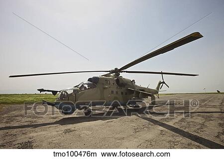 An Mi-35 attack helicopter at Kunduz Airfield, Afghanistan. View Large Photo Image Picture - An Mi-35 attack helicopter at Kunduz Airfield, Afghanistan.. Fotosearch