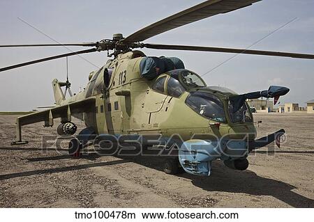 An Mi-35 attack helicopter at Kunduz Airfield, Afghanistan. View Large Photo Image Picture - An Mi-35 attack helicopter at Kunduz Airfield, Afghanistan.. Fotosearch