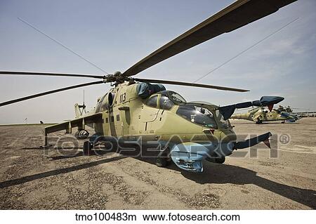 An Mi-35 attack helicopter at Kunduz Airfield, Afghanistan. View Large Photo Image Picture - An Mi-35 attack helicopter at Kunduz Airfield, Afghanistan.. Fotosearch