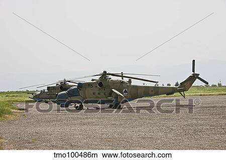 An Mi-35 attack helicopter at Kunduz Airfield, Afghanistan. View Large Photo Image Picture - An Mi-35 attack helicopter at Kunduz Airfield, Afghanistan.. Fotosearch