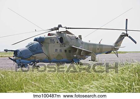 An Mi-35 attack helicopter at Kunduz Airfield, Afghanistan. View Large Photo Image Picture - An Mi-35 attack helicopter at Kunduz Airfield, Afghanistan.. Fotosearch