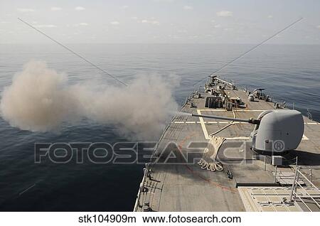 An Mk-45 lightweight gun is fired aboard guided missile destroyer USS Mitscher. View Large Photo Image Picture - An Mk-45 lightweight gun is fired aboard guided missile destroyer USS Mitscher.. Fotosearch