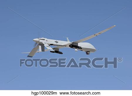 An MQ-1 Predator flies a training mission over New Mexico. View Large Photo Image Picture - An MQ-1 Predator flies a training mission over New Mexico.. Fotosearch