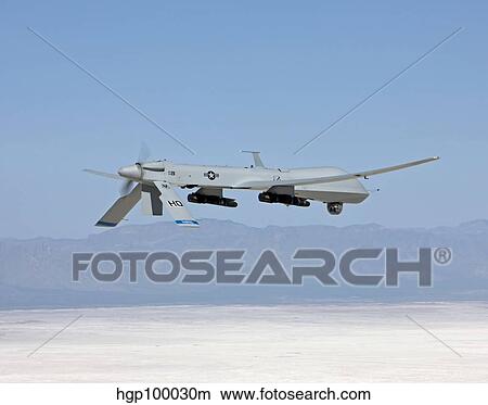 An MQ-1 Predator flies a training mission over New Mexico. View Large Photo Image Picture - An MQ-1 Predator flies a training mission over New Mexico.. Fotosearch