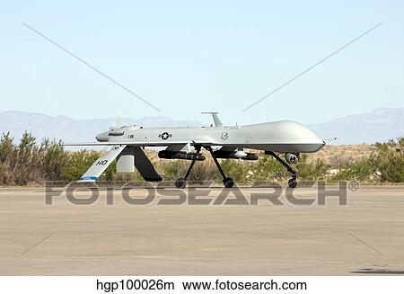An MQ-1 Predator taxi's to the runway at Holloman Air Force Base. View Large Photo Image Picture - An MQ-1 Predator taxi's to the runway at Holloman Air Force Base.. Fotosearch