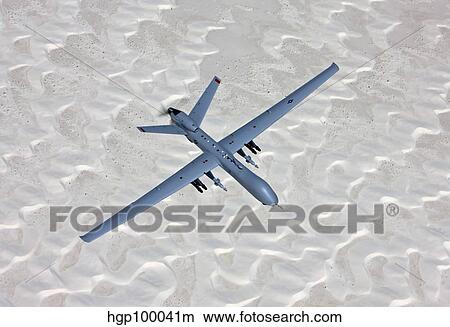 An MQ-9 Reaper flies a training mission over Southern New Mexico. View Large Photo Image Picture - An MQ-9 Reaper flies a training mission over Southern New Mexico.. Fotosearch