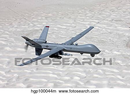 An MQ-9 Reaper flies a training mission over Southern New Mexico. View Large Photo Image Picture - An MQ-9 Reaper flies a training mission over Southern New Mexico.. Fotosearch