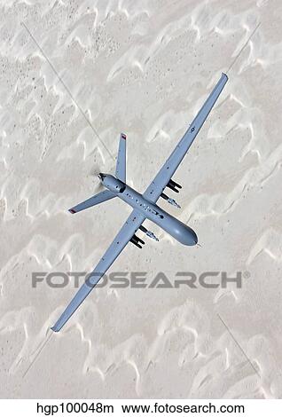 An MQ-9 Reaper flies a training mission over Southern New Mexico. View Large Photo Image Picture - An MQ-9 Reaper flies a training mission over Southern New Mexico.. Fotosearch