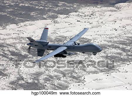 An MQ-9 Reaper flies a training mission over Southern New Mexico. View Large Photo Image Picture - An MQ-9 Reaper flies a training mission over Southern New Mexico.. Fotosearch