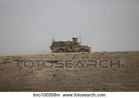 An MRAP vehicle patrols the ridge of a wadi near Kunduz, Afghnanistan. View Large Photo Image Picture - An MRAP vehicle patrols the ridge of a wadi near Kunduz, Afghnanistan.. Fotosearch