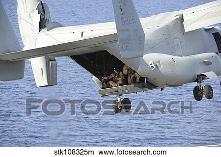 An MV-22 Osprey aircraft takes off. View Large Photo Image Picture - An MV-22 Osprey aircraft takes off.. Fotosearch