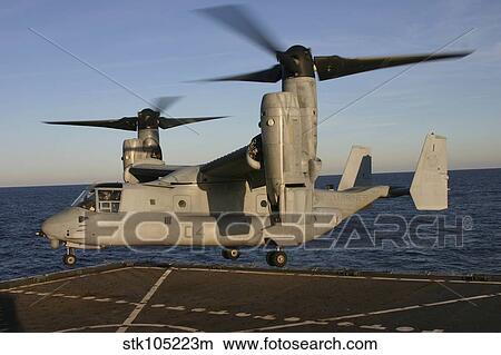 An MV-22 Osprey lands aboard USNS Robert E. Peary. View Large Photo Image Picture - An MV-22 Osprey lands aboard USNS Robert E. Peary.. Fotosearch