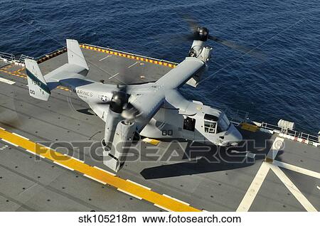 An MV-22 Osprey lands aboard USS Peleliu. View Large Photo Image Picture - An MV-22 Osprey lands aboard USS Peleliu.. Fotosearch