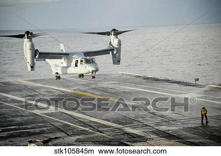 An MV-22 Osprey lands on the flight deck of USS George H. W. Bush. View Large Photo Image Picture - An MV-22 Osprey lands on the flight deck of USS George H. W. Bush.. Fotosearch