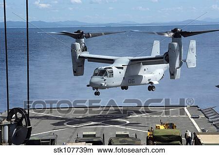 An MV-22 Osprey lands on the flight deck of USS Germantown. View Large Photo Image Picture - An MV-22 Osprey lands on the flight deck of USS Germantown.. Fotosearch